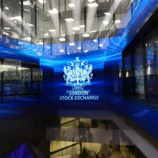London stocks fall after Trump issues tariff threat; Beazley hits record high