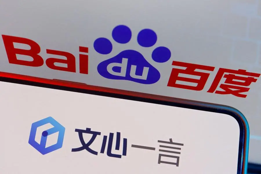 FILE PHOTO: The logo of Baidu\\'s AI chatbot Ernie Bot is displayed near a screen showing the Baidu logo, in this illustration picture taken June 28, 2023. REUTERS/Florence Lo/Illustration. , Reuters