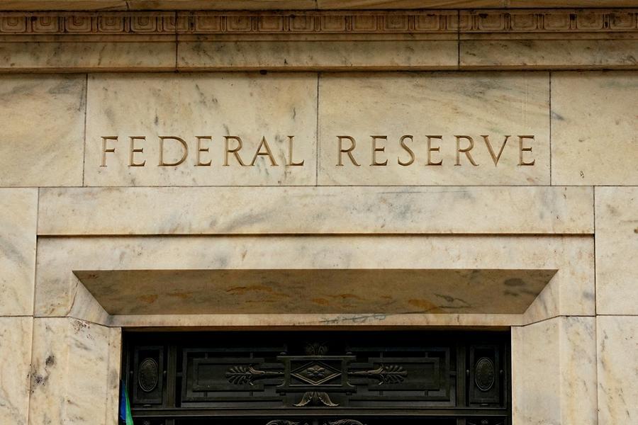 Fed holds rates steady, sees 'elevated' inflation and stabilizing job market
