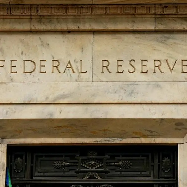 Fed holds rates steady, sees 'elevated' inflation and stabilizing job market