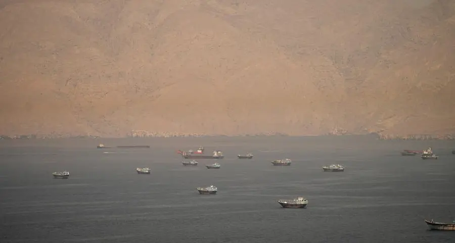 Traffic flows through Hormuz as US-Iran deal takes effect, questions remain