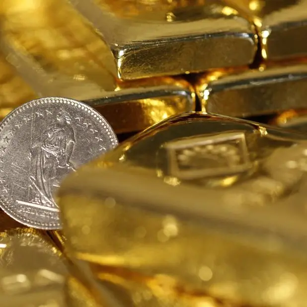 Gold edges lower on stronger equities as investors look ahead to next Fed meeting