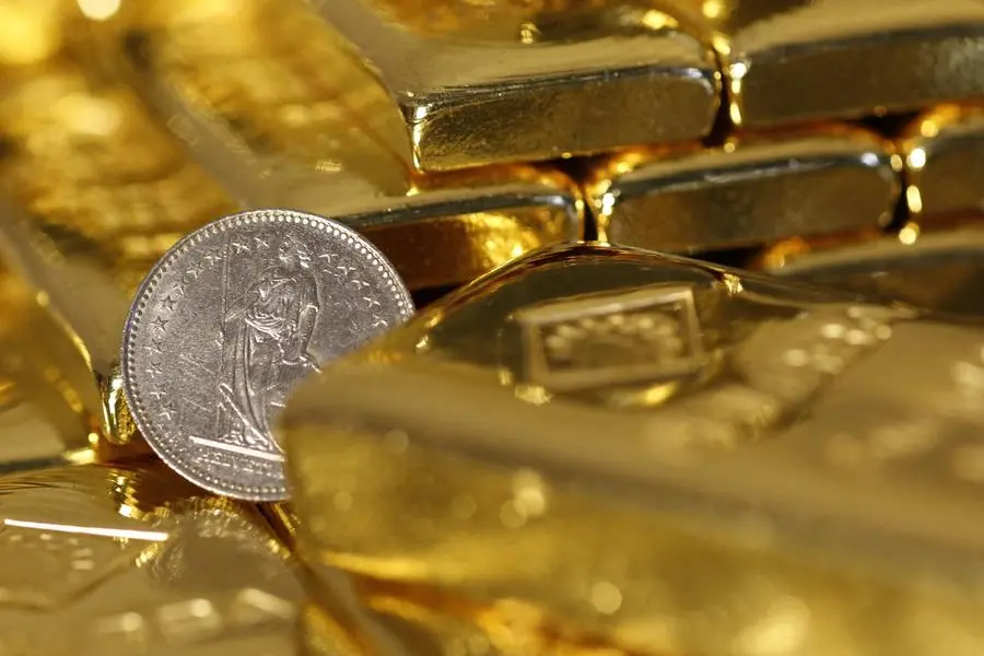 Gold edges lower on stronger equities as investors look ahead to next Fed meeting