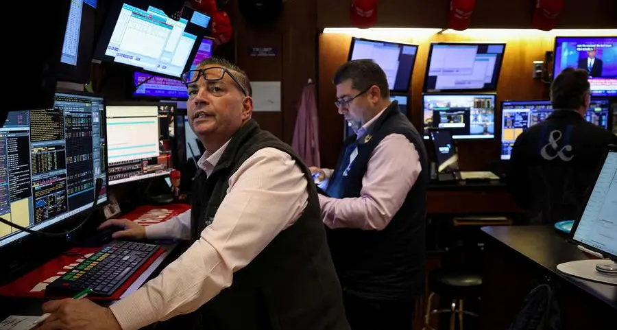 Japanese stocks jump, dollar firms on trade hopes; bitcoin soars