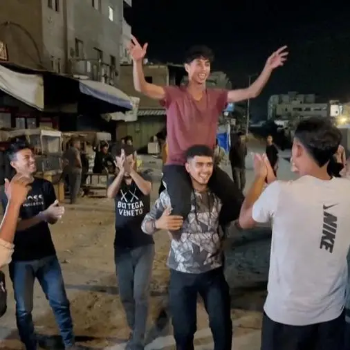 Israelis, Palestinians celebrate after agreement on Gaza ceasefire and return of hostages