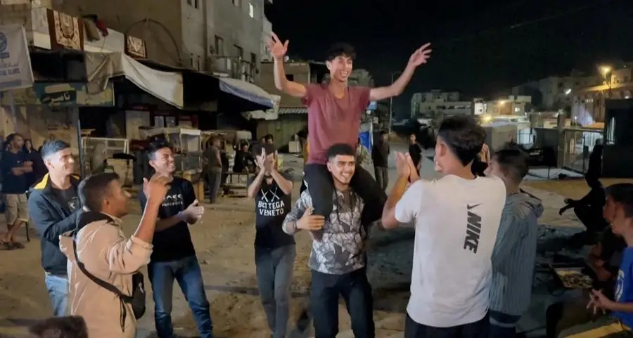 Israelis, Palestinians celebrate after agreement on Gaza ceasefire and return of hostages