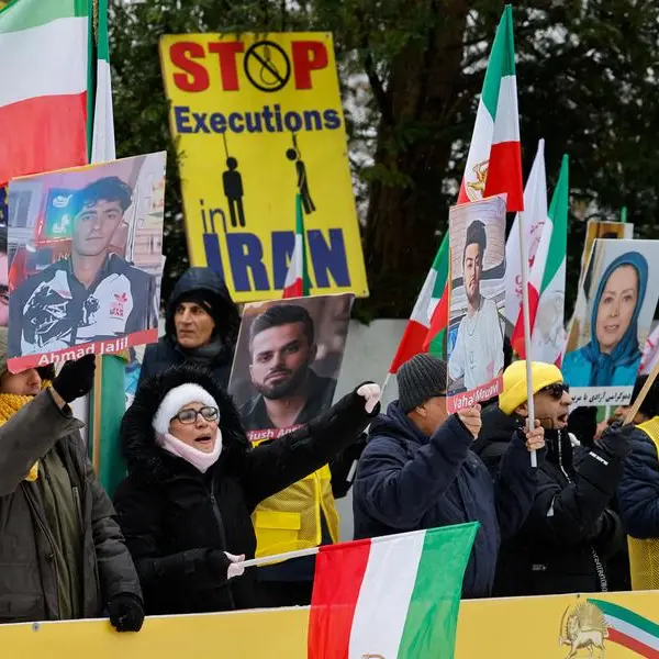 Trump issues 'locked and loaded' warning to Iran amid deadly protests