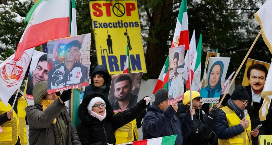 Trump issues 'locked and loaded' warning to Iran amid deadly protests