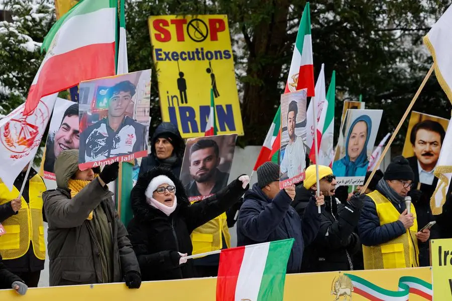 Trump issues 'locked and loaded' warning to Iran amid deadly protests