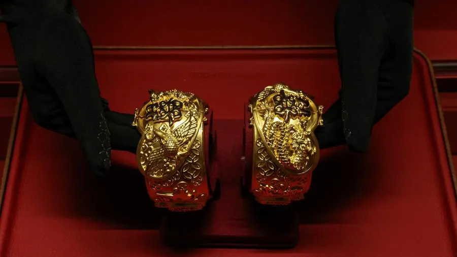 Gold gains as Middle East peace optimism pushes dollar, oil prices lower