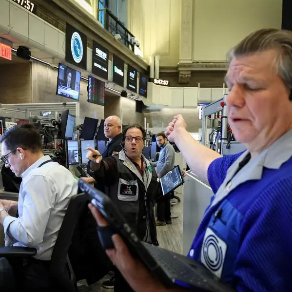 Stocks, dollar take tariff hit; gold gets safety bid