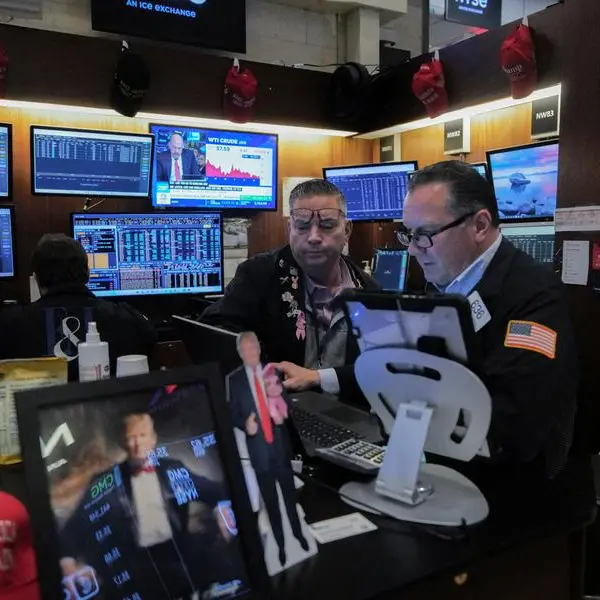 World stocks at record high as earnings hopes offset trade angst