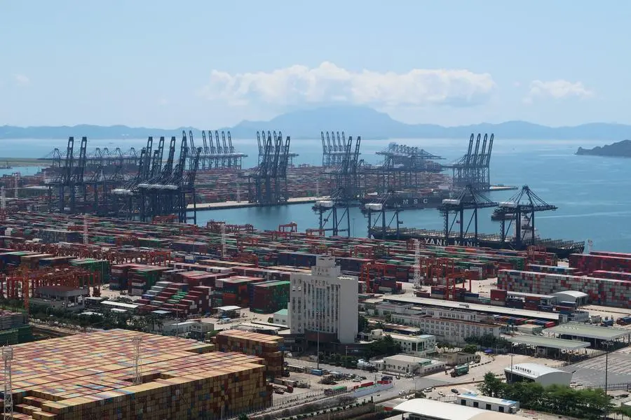 FILE PHOTO: Cranes and containers are seen at the Yantian port in Shenzhen, following the novel coronavirus disease (COVID-19) outbreak, Guangdong province, China May 17, 2020. Picture taken May 17, 2020. REUTERS/Martin Pollard. , Reuters
