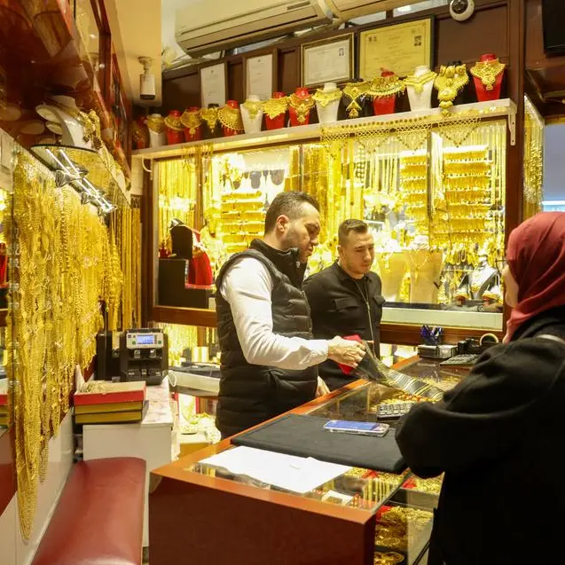 Gold climbs off more than one-month low; Middle East risks linger