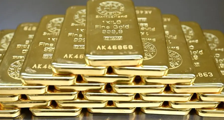Gold hits two-week low as easing trade tensions boost risk appetite