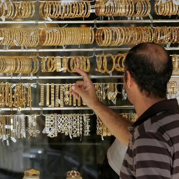 Gold breaks records as investors seek shelter from market turbulence