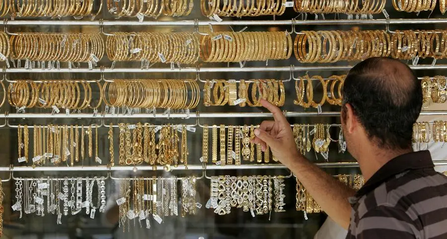 Gold breaks records as investors seek shelter from market turbulence