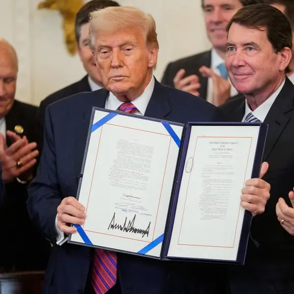 Crypto-linked stocks advance after Trump signs stablecoin law