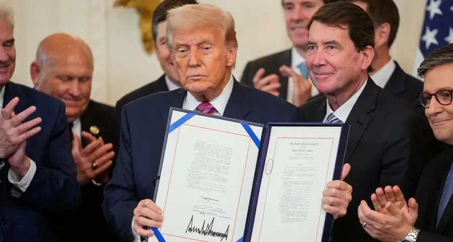 Crypto-linked stocks advance after Trump signs stablecoin law