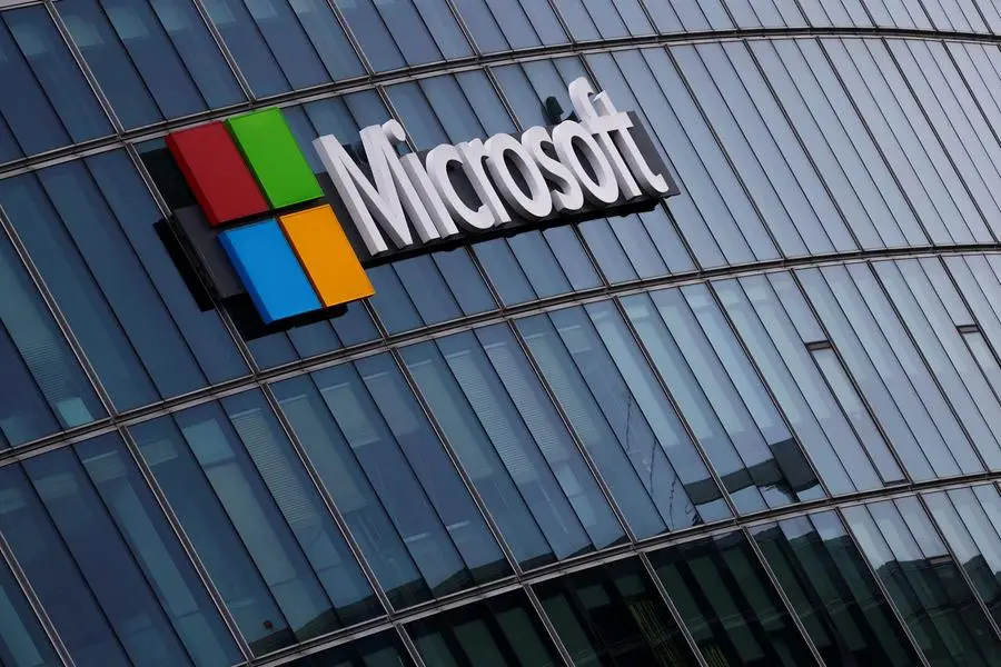 FILE PHOTO: A view shows a Microsoft logo at Microsoft offices in Issy-les-Moulineaux near Paris, France, March 21, 2025. REUTERS/Gonzalo Fuentes. , Reuters