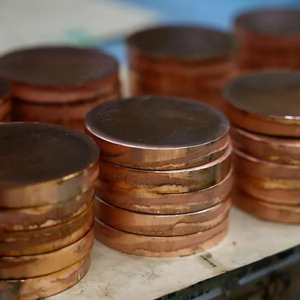 Copper hits record high above $14,000 as speculators pile in