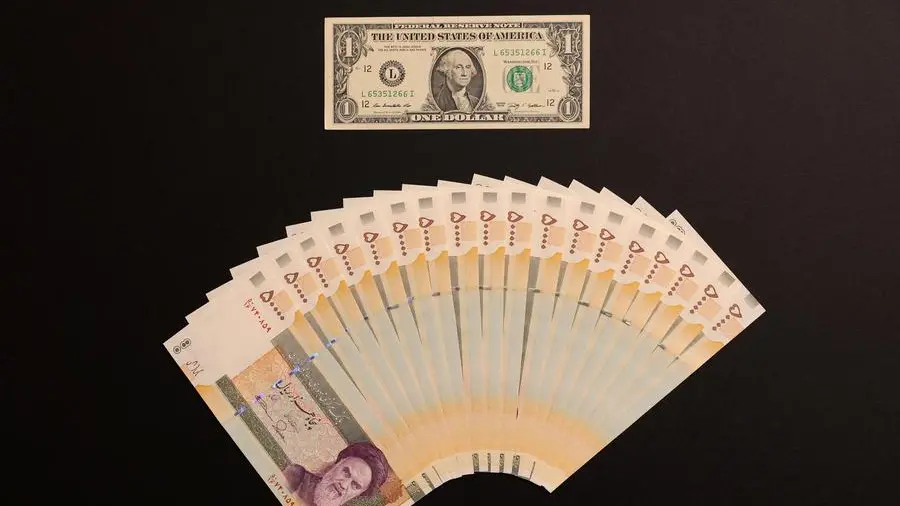 Iran's currency drops to record low level of 1.8mln rials to the dollar, ISNA reports