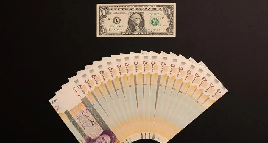 Iran's currency drops to record low level of 1.8mln rials to the dollar, ISNA reports