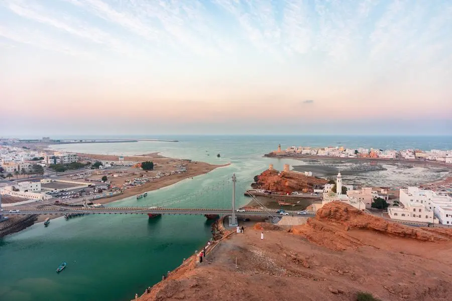 Panoramic view on west and east part of the Sur city connected by Al Ayjah Bridge, golden hour. Sur Province, Sur, Oman. Image used for illustrative purpose Getty Images , Getty Images
