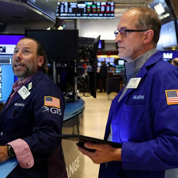 Global shares steady, dollar slips as focus turns to Fed policy