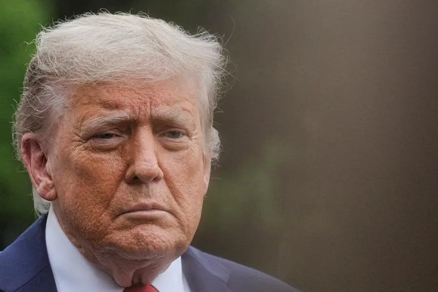 U.S. President Donald Trump looks on as he departs the White House to attend the G7 summit in Canada, in Washington, D.C., U.S., June 15, 2025. REUTERS/Ken Cedeno. , Reuters