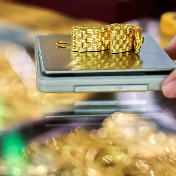 Gold steadies after sell-off as markets await US data