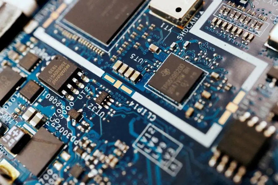 FILE PHOTO: FILE PHOTO: Semiconductor chips are seen on a circuit board of a computer in this illustration picture taken February 25, 2022. REUTERS/Florence Lo/Illustration/File Photo/File Photo , Reuters/REUTERS