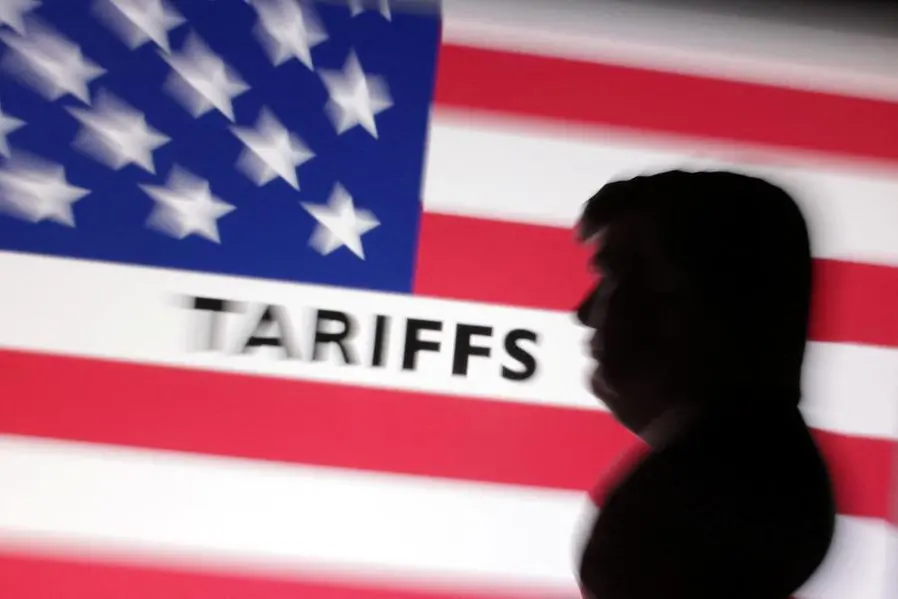 A 3D-printed miniature model of U.S. President Donald Trump and the U.S. flag pattern with the word \"tariffs\" are seen in this illustration taken April 7, 2025. REUTERS/Dado Ruvic/Illustration. , Reuters