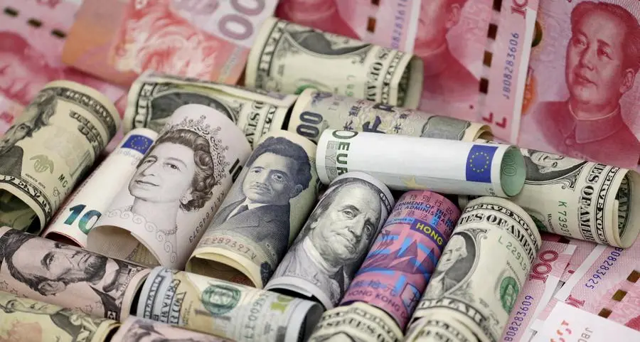 Dollar holds firm after Fed raises inflation alarm, yen slips past 160