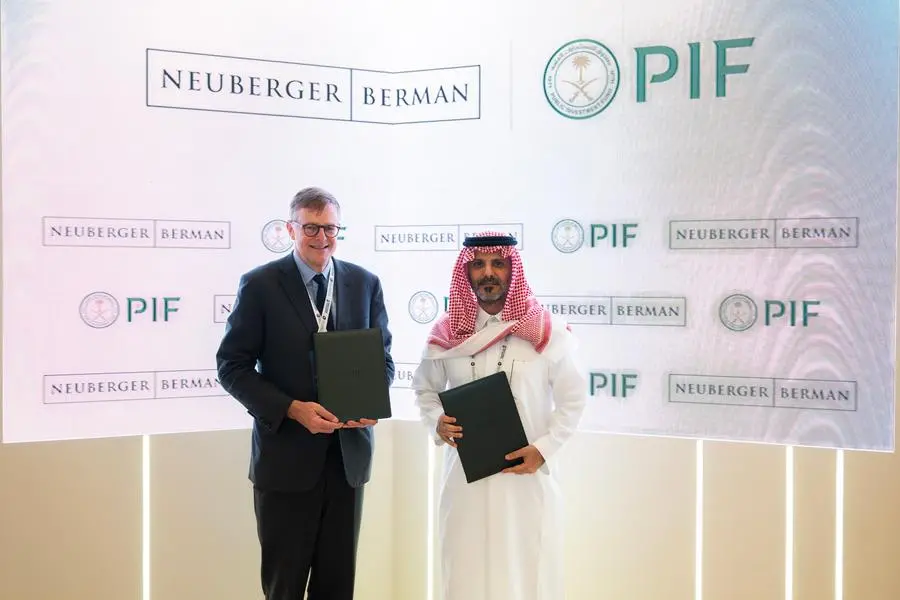Abdulmajeed Alhagbani, Head of Securities Investments, MENA Investments Division at PIF and George Walker, Chief Executive Officer of Neuberger Berman. Image Courtesy: PIF