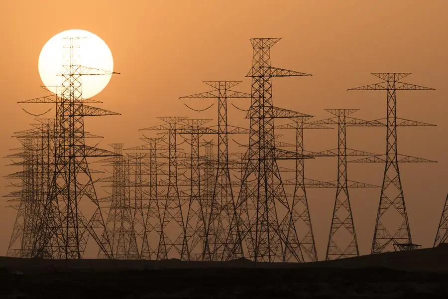 Transmission lines in Saudi Arabia at sunset. Image used for illustrative purpose. Image courtesy: Segi/ Getty Images , Getty Images/iStockphoto