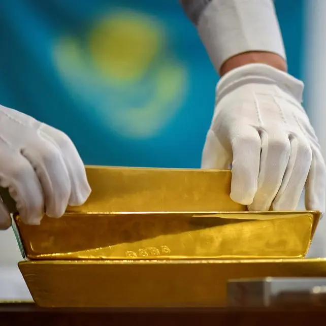 Gold dips from one-week high on steady dollar; other precious metals slip