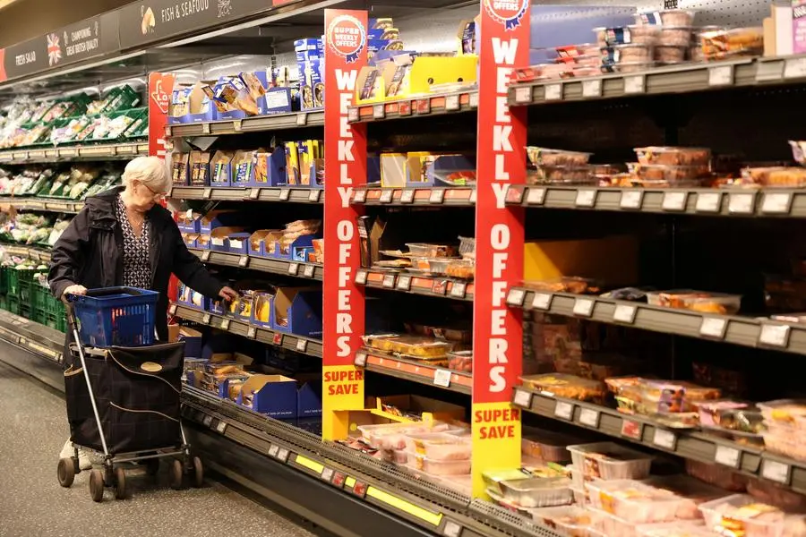 FILE PHOTO: A customer shops in Aldi, in London, Britain, September 9, 2024. REUTERS/Mina Kim. , Reuters