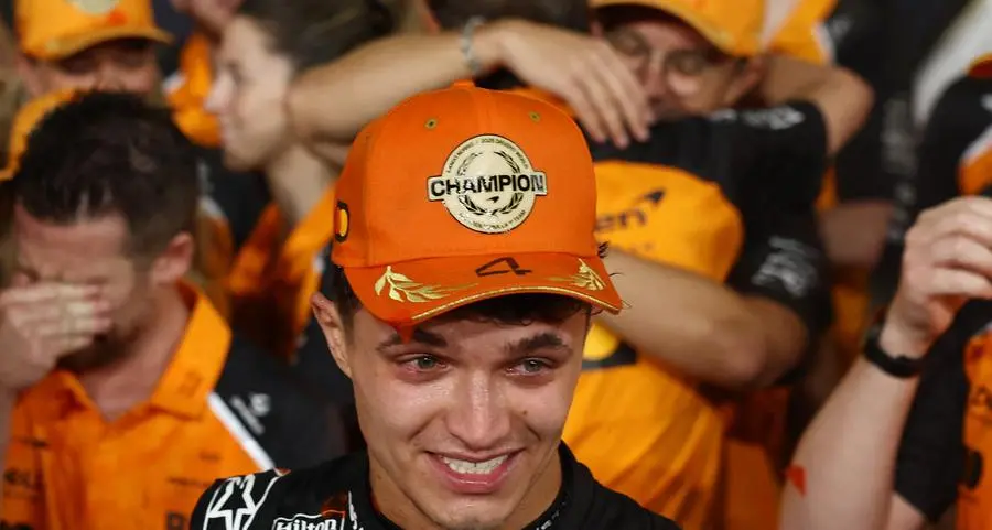 Motor racing: Tearful Norris takes F1 title as Verstappen wins Abu Dhabi race
