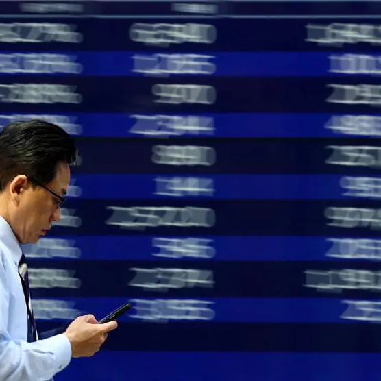 Asian shares creep higher, dollar languishes before ECB