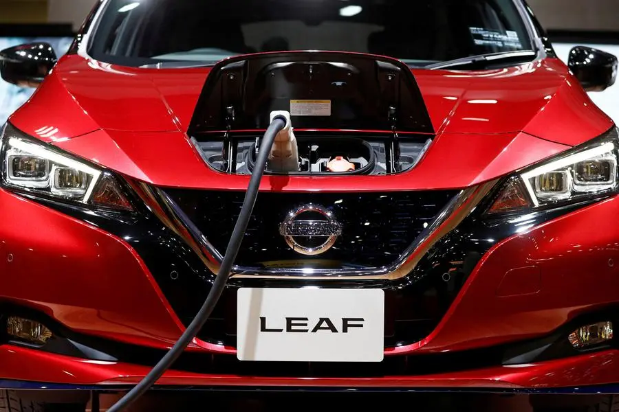 FILE PHOTO: A charging cable is attached to a Nissan Leaf electric car at the Tokyo Motor Show, in Tokyo, Japan, October 24, 2019. REUTERS/Edgar Su/File Photo , Reuters/REUTERS