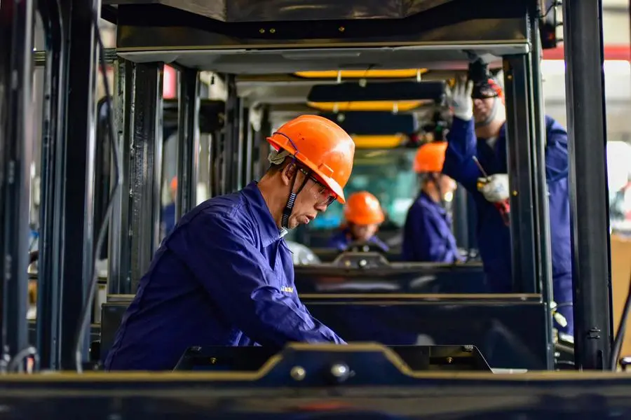 <p>Photo used for illustrative purpose only. Workers build cabs for excavators at a factory in Qingzhou, in China&#39;s eastern Shandong province on October 31, 2024.&nbsp;(Photo by AFP).</p>\\n , Agence France-Presse (AFP)