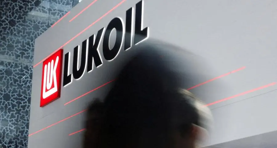Russia's Lukoil, under sanctions, agrees to sell international assets to US Carlyle Group