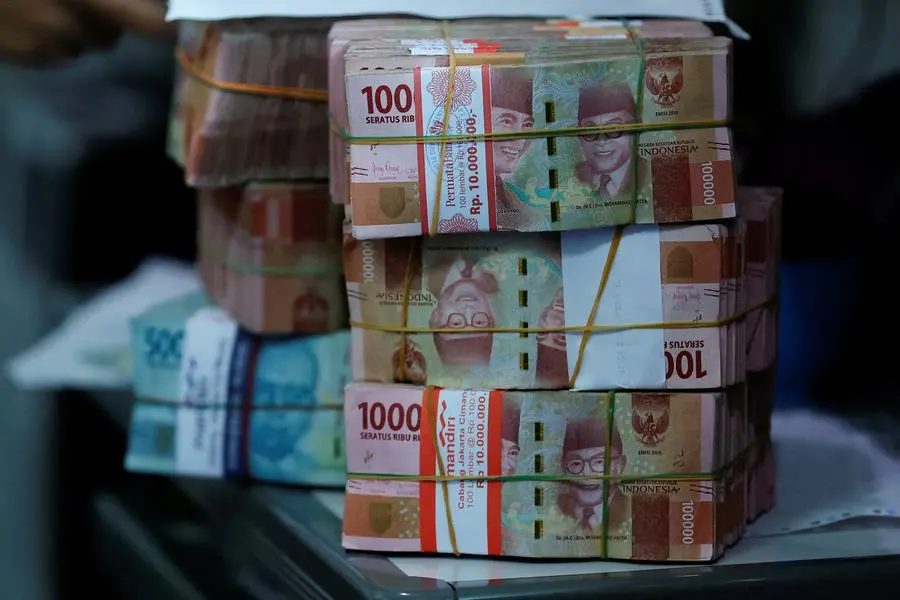 FILE PHOTO: Indonesian rupiah bank notes are seen at a money changer in Jakarta, Indonesia, October 14, 2022. REUTERS/Willy Kurniawan. , Reuters