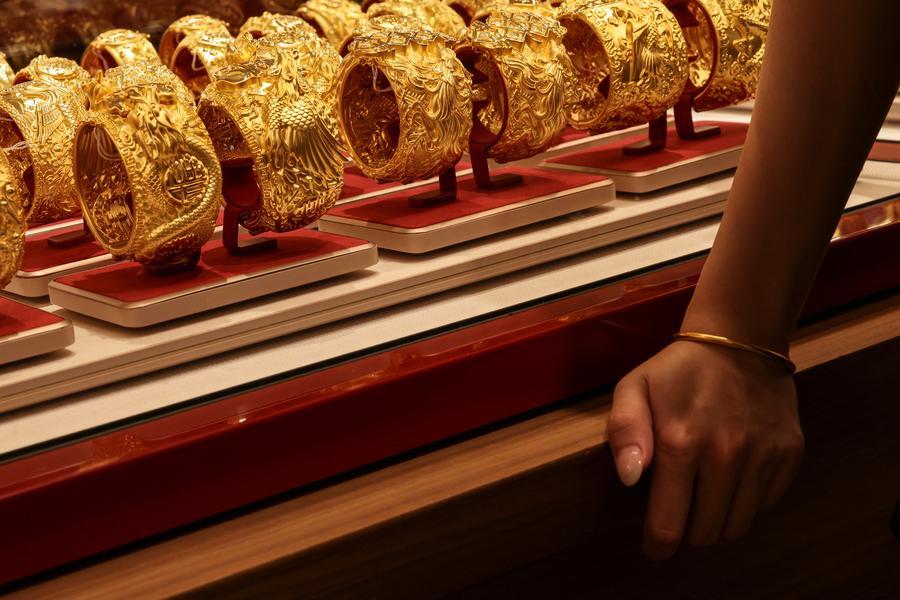 Gold, silver rise as stock selloff lifts safe-haven demand; CME hikes margins again