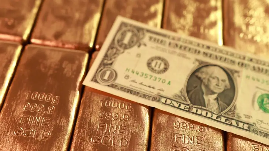 Gold rebounds from one-month low on softer dollar