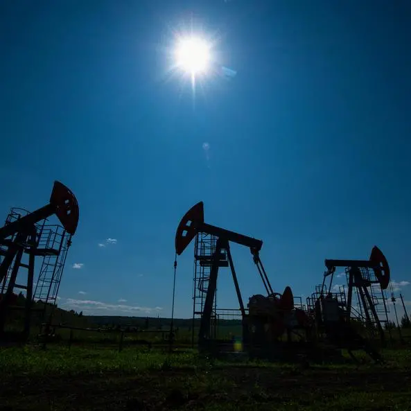 Oil inches down as investors focus on Hormuz flows after peace talks