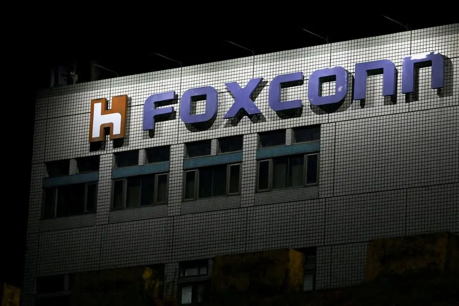 FILE PHOTO: The logo of Foxconn is seen outside the company\\'s building in Taipei, Taiwan November 10, 2022. REUTERS/Ann Wang. , Reuters