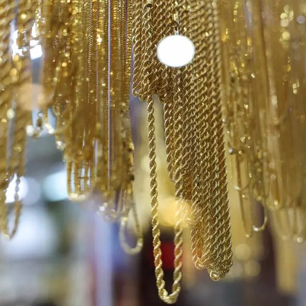 Gold hits two-week high on safe-haven demand; Fed decision looms