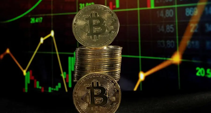 Bitcoin tops $100,000, stocks party at record highs